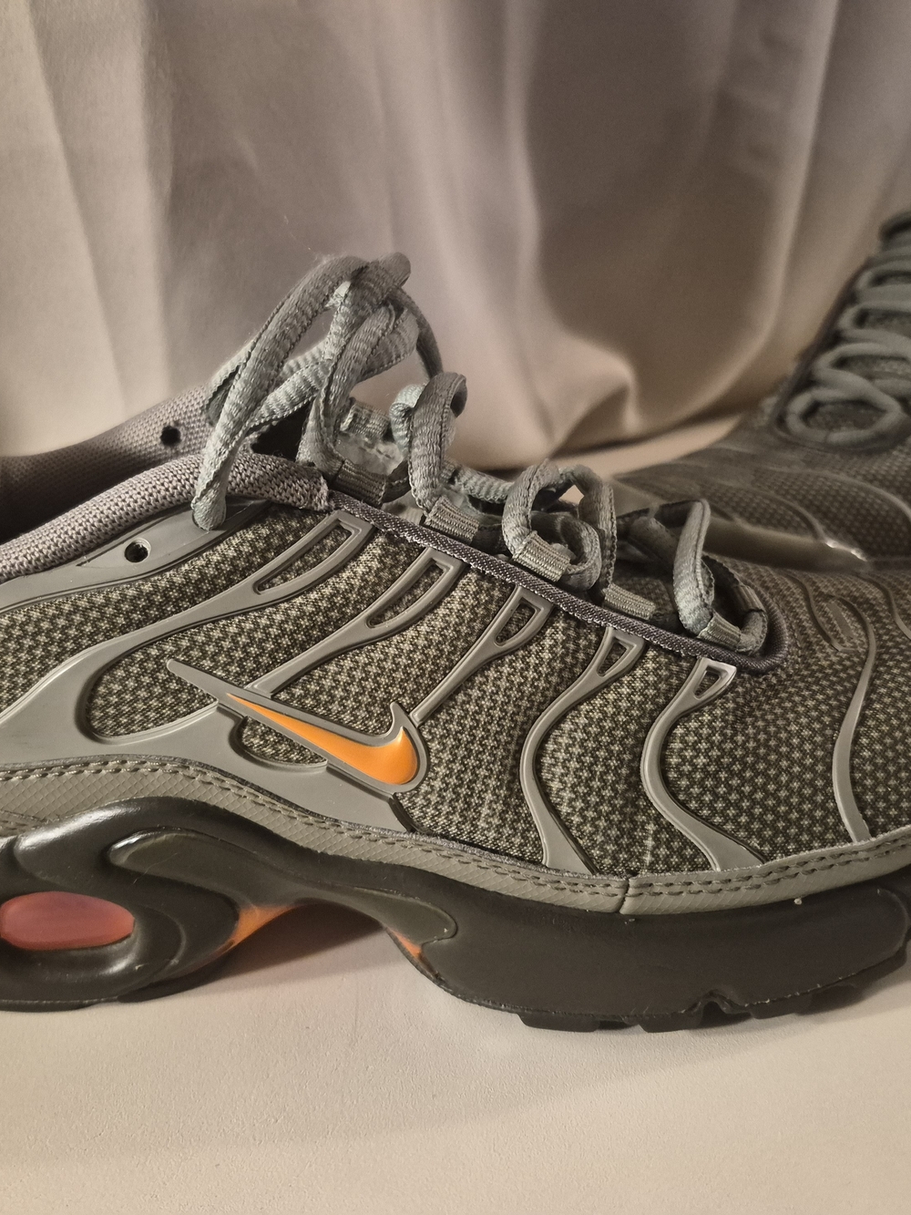 Nike Grey Sneakers with Orange Swoosh Accent